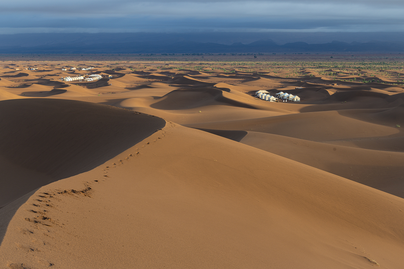 Golden Sahara dunes at sunrise — Erg Chegaga trekking Morocco