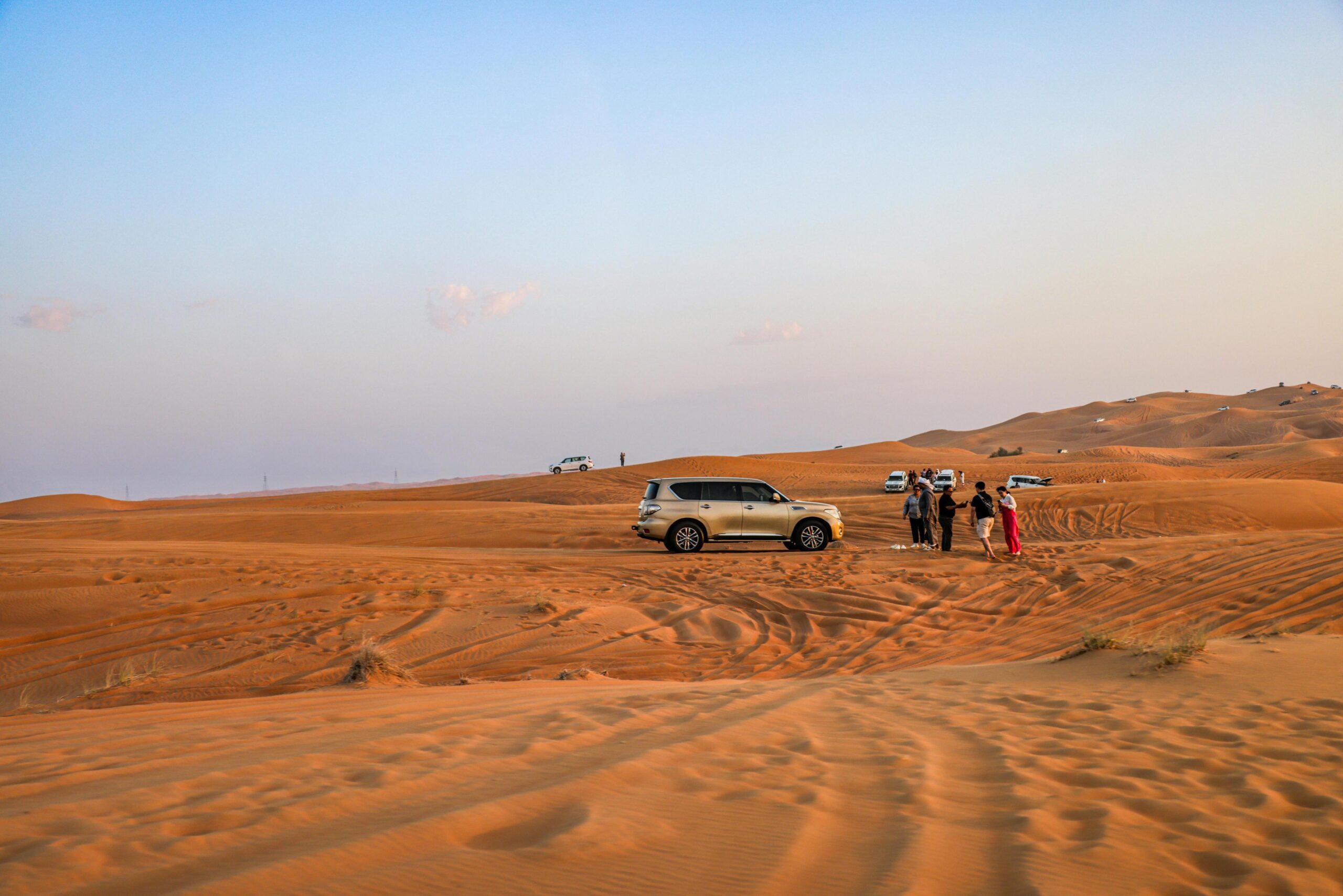 4x4 Sahara desert adventure — crossing golden dunes near Erg Chegaga