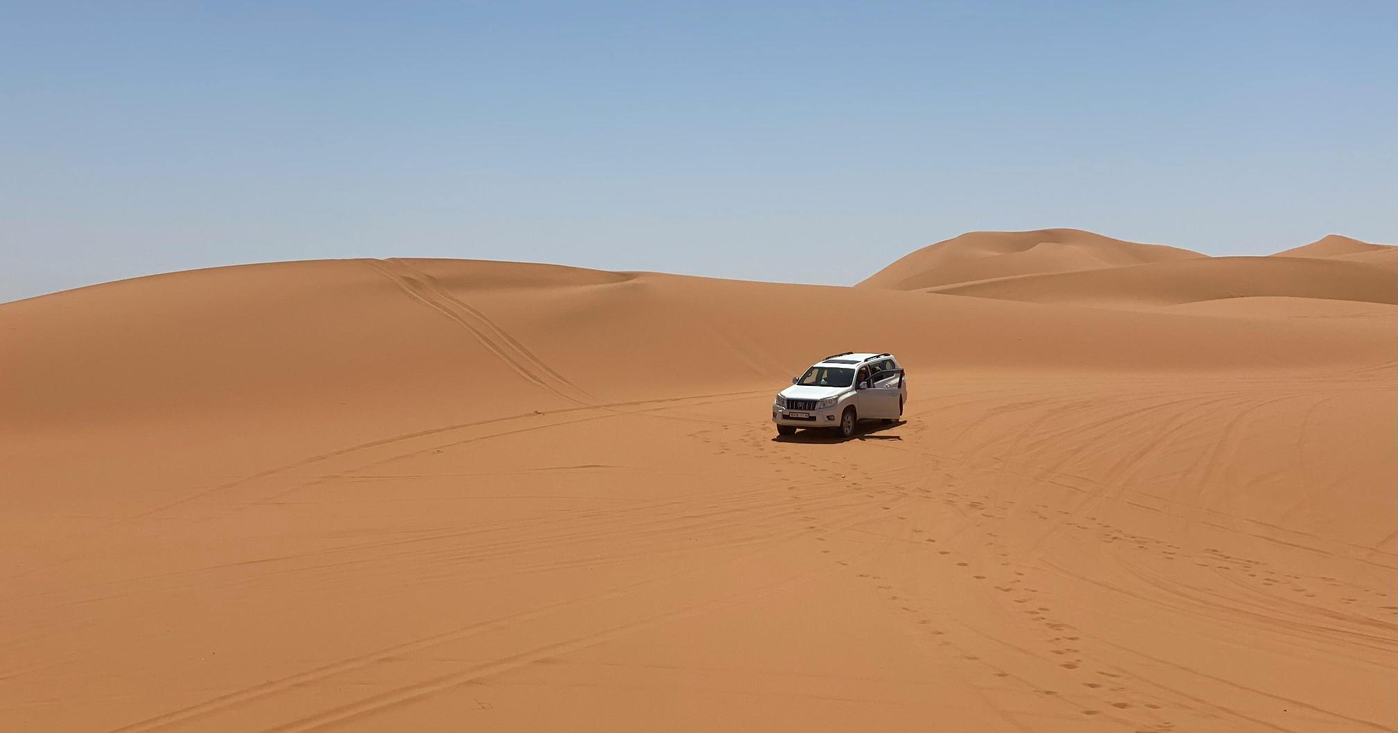 Camel ride at sunset during Sahara 4x4 tour from Marrakech